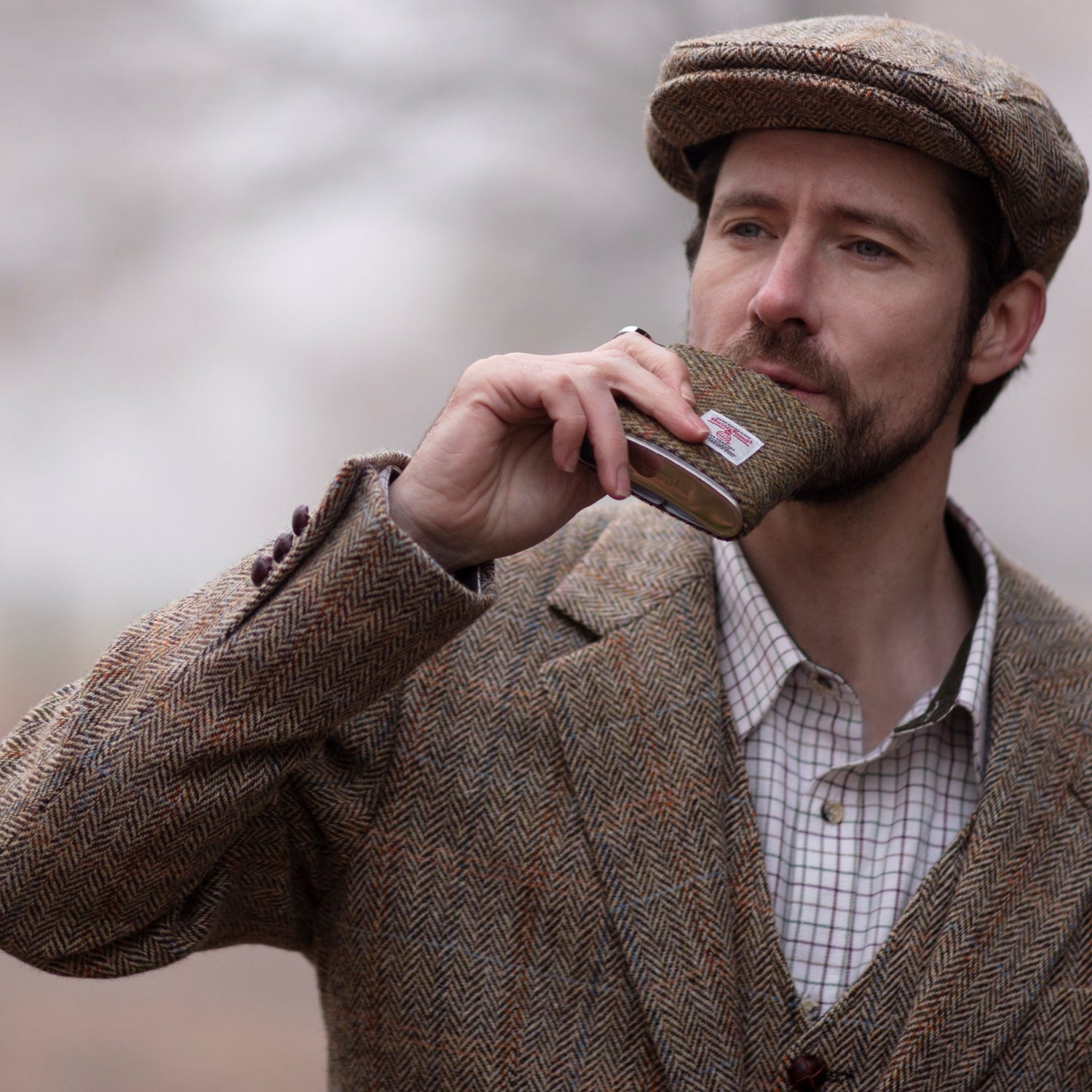 Elegant 6oz Hip Flask with removable Harris Tweed sleeve, perfect for personalisation and stylish gifting, showcasing our unique Hip Flasks collection.