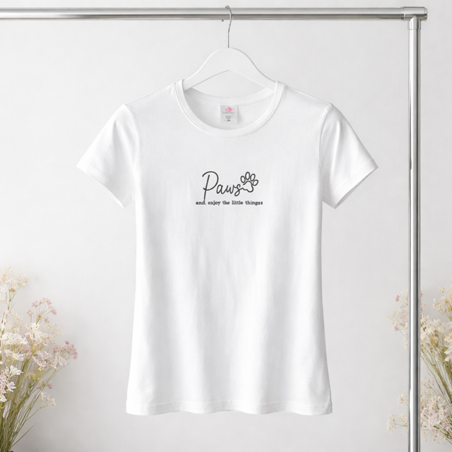 White dog lover t-shirt with embroidered paw slogan - detail view