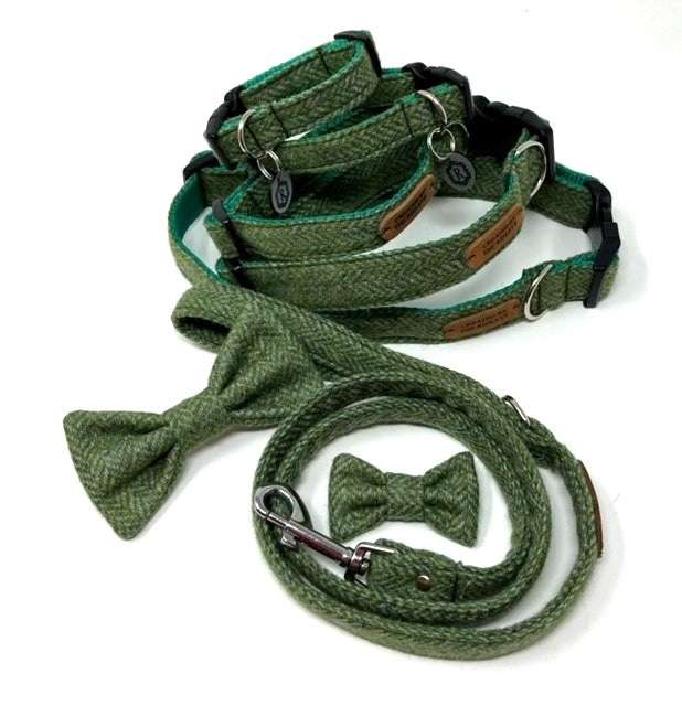 Handmade Green Herringbone Tweed Dog Collar set featuring collars, matching bow ties, and leads, designed by Created By The Ridleys for stylish pet accessories.