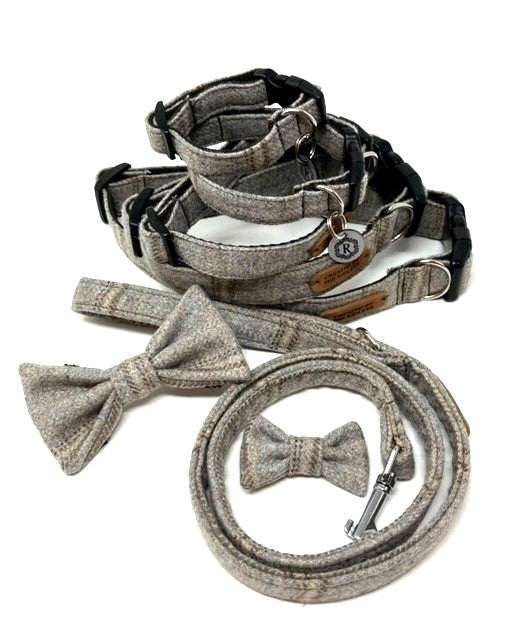 Handmade British Tweed Dog Collar - Grey Tweed by Created By The Ridleys, showcasing a stylish matching bow tie and lead, perfect for your pet's fashionable look.