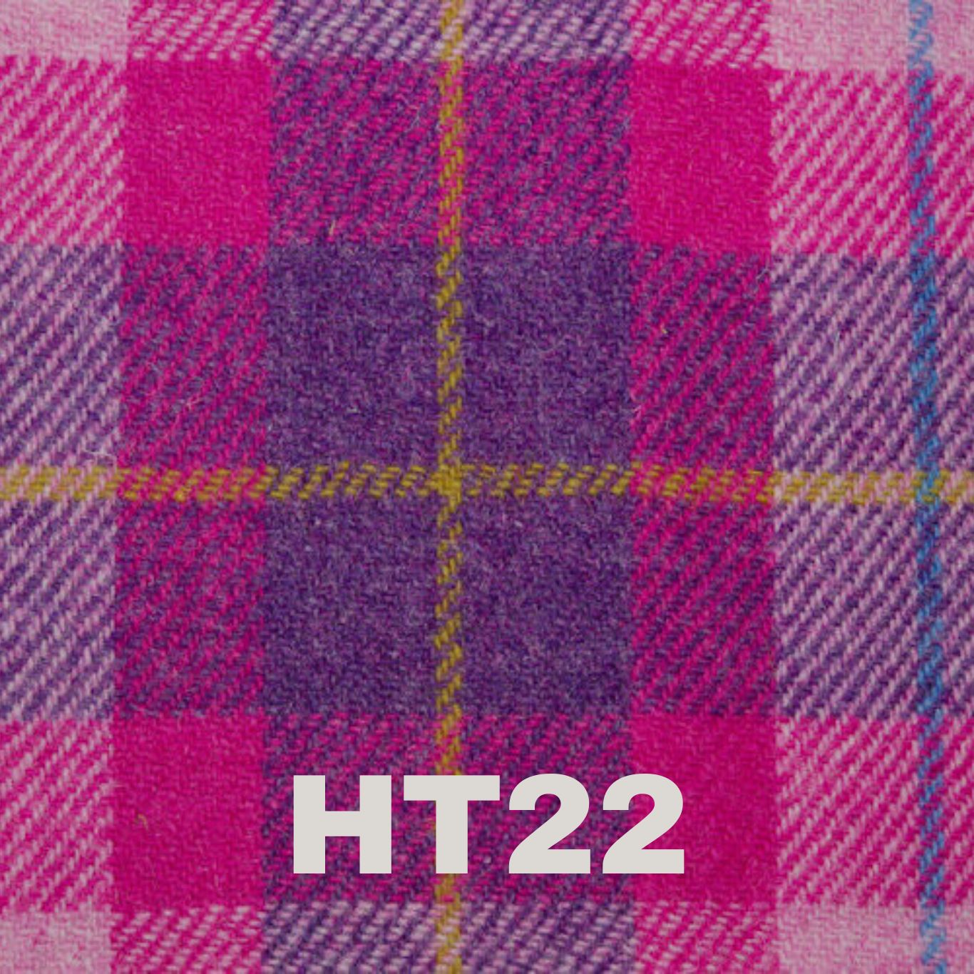 6oz Stainless Steel Hip Flask with Harris Tweed Wrap, held in hand to demonstrate its compact size and portability.