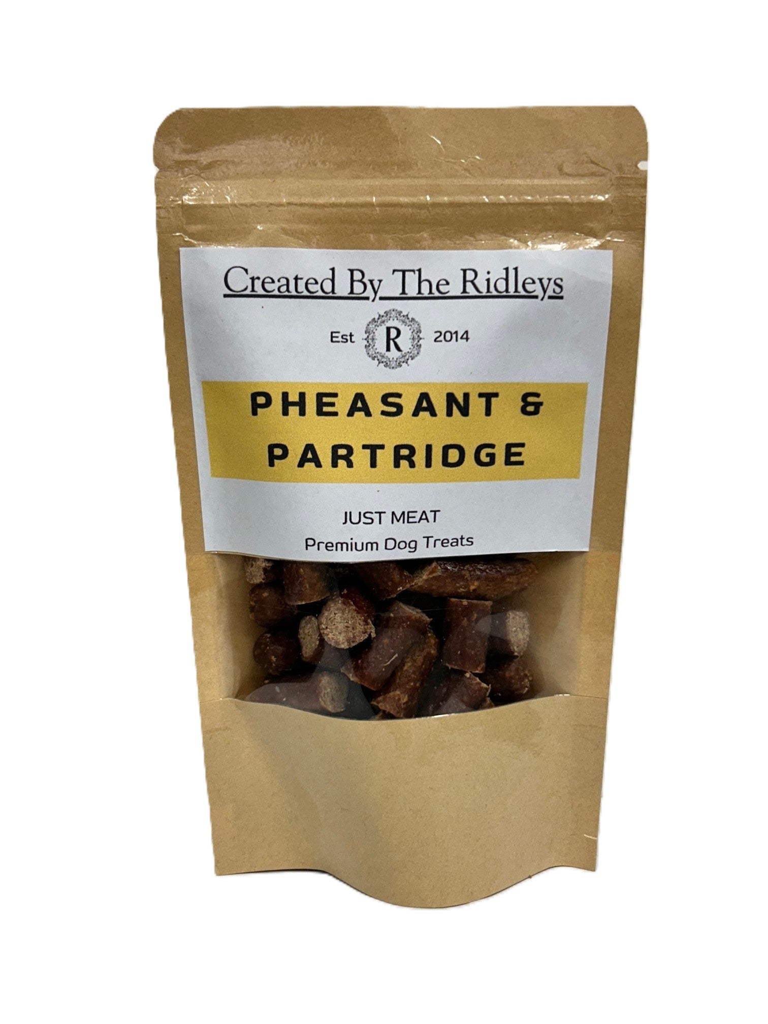Kraft paper packaging of pheasant and partridge dog treats with a white label.