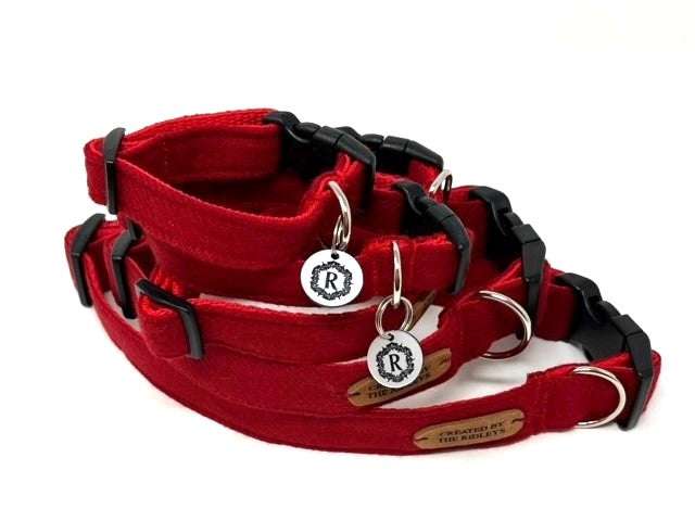 Handmade Red Tweed Dog Collar collection showing various sizes with contoured buckle by The Ridleys.