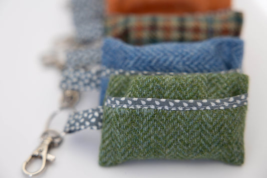 Set of fabric pouches with zippers on a white background