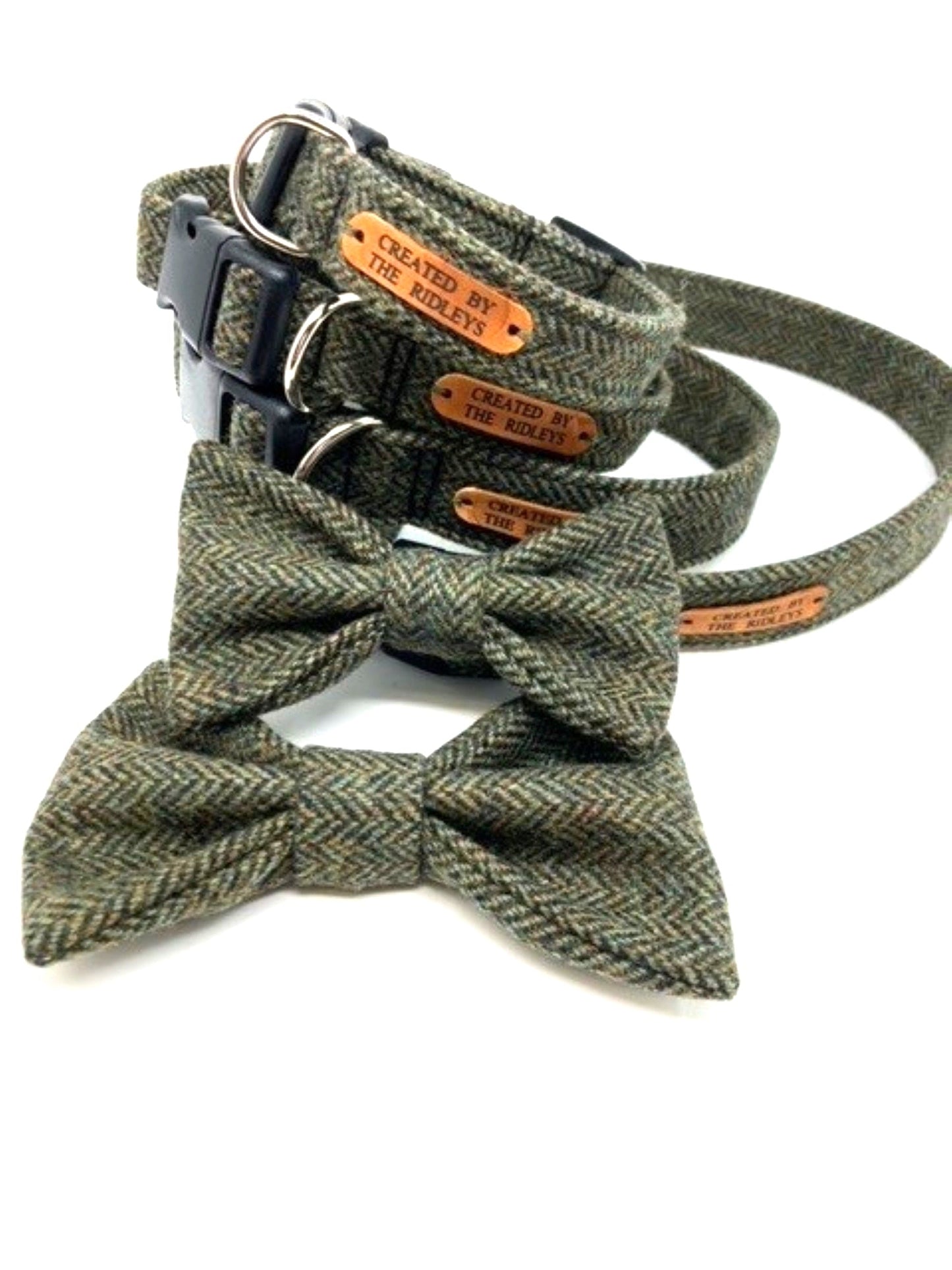 A close-up of the Handmade Moss Herringbone Tweed Dog Collar alongside a matching bow tie by Created By The Ridleys, displaying the exquisite craftsmanship and design details.