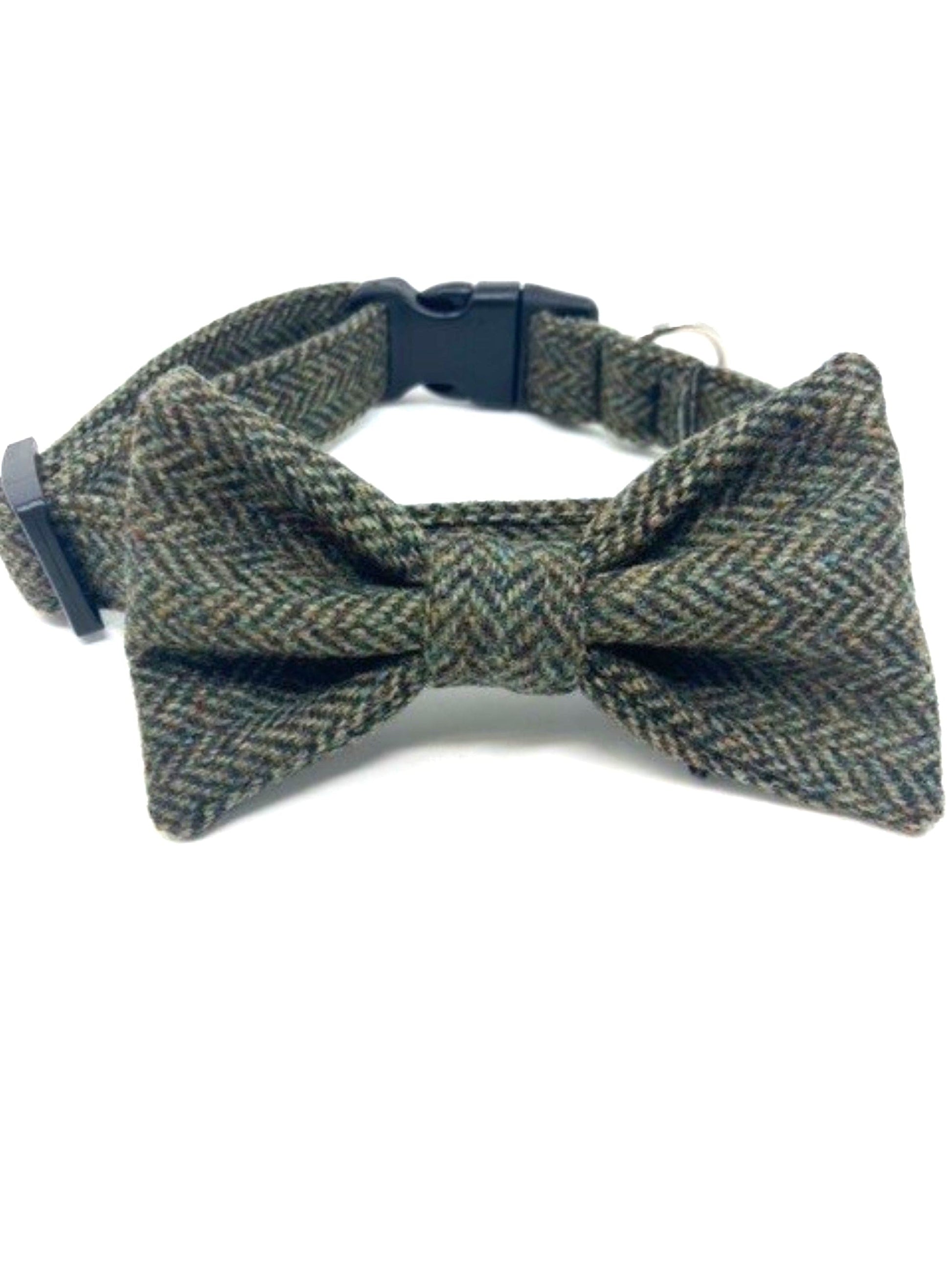 A detailed view of a Handmade Moss Herringbone Tweed Dog Collar featuring a bow tie by Created By The Ridleys, showcasing the quality materials and design that make it ideal for fashionable pets.