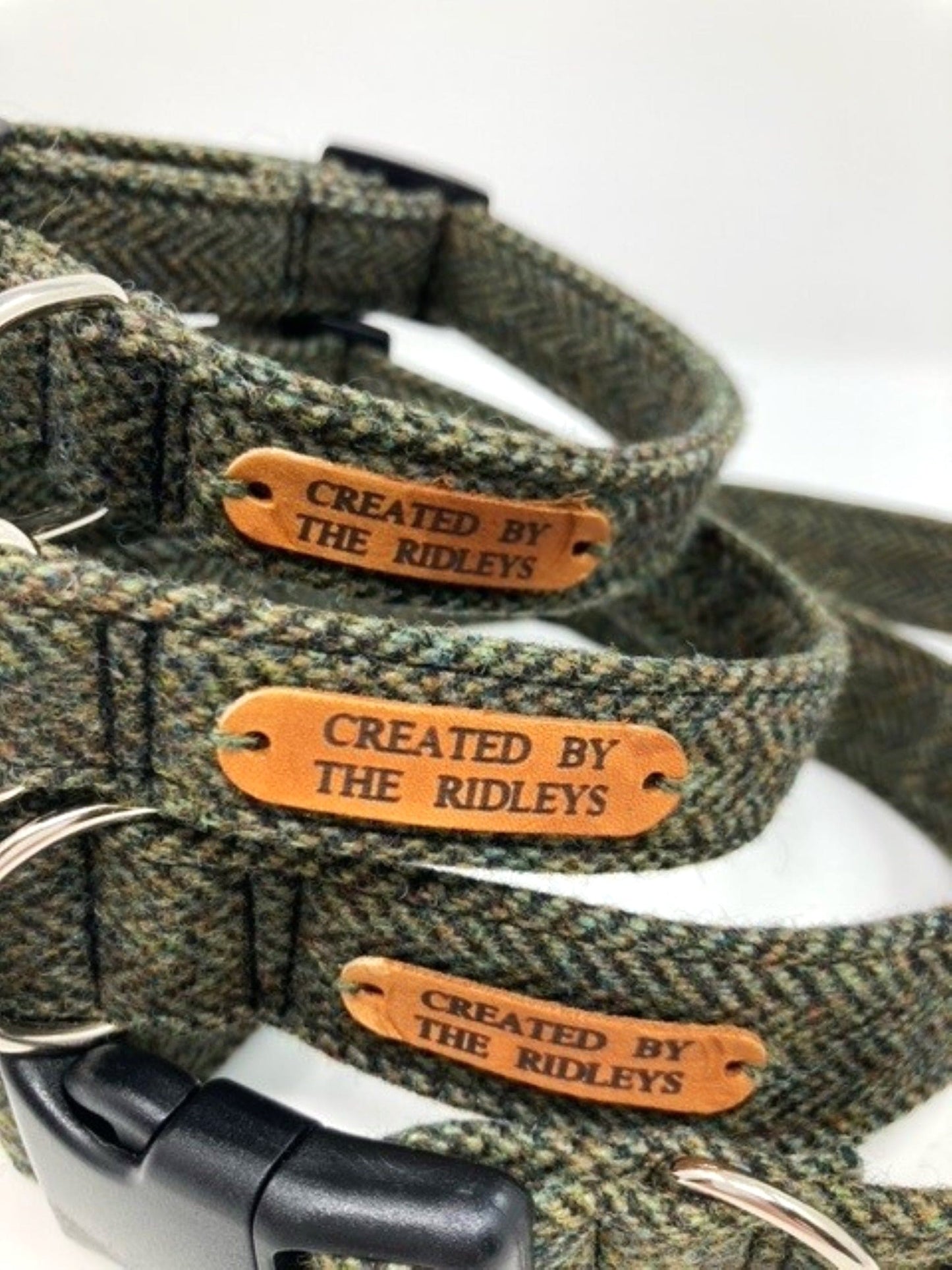 Handmade Moss Herringbone Tweed Dog Collar with Contoured Buckle by Created By The Ridleys, featuring durable design with a leather tag.