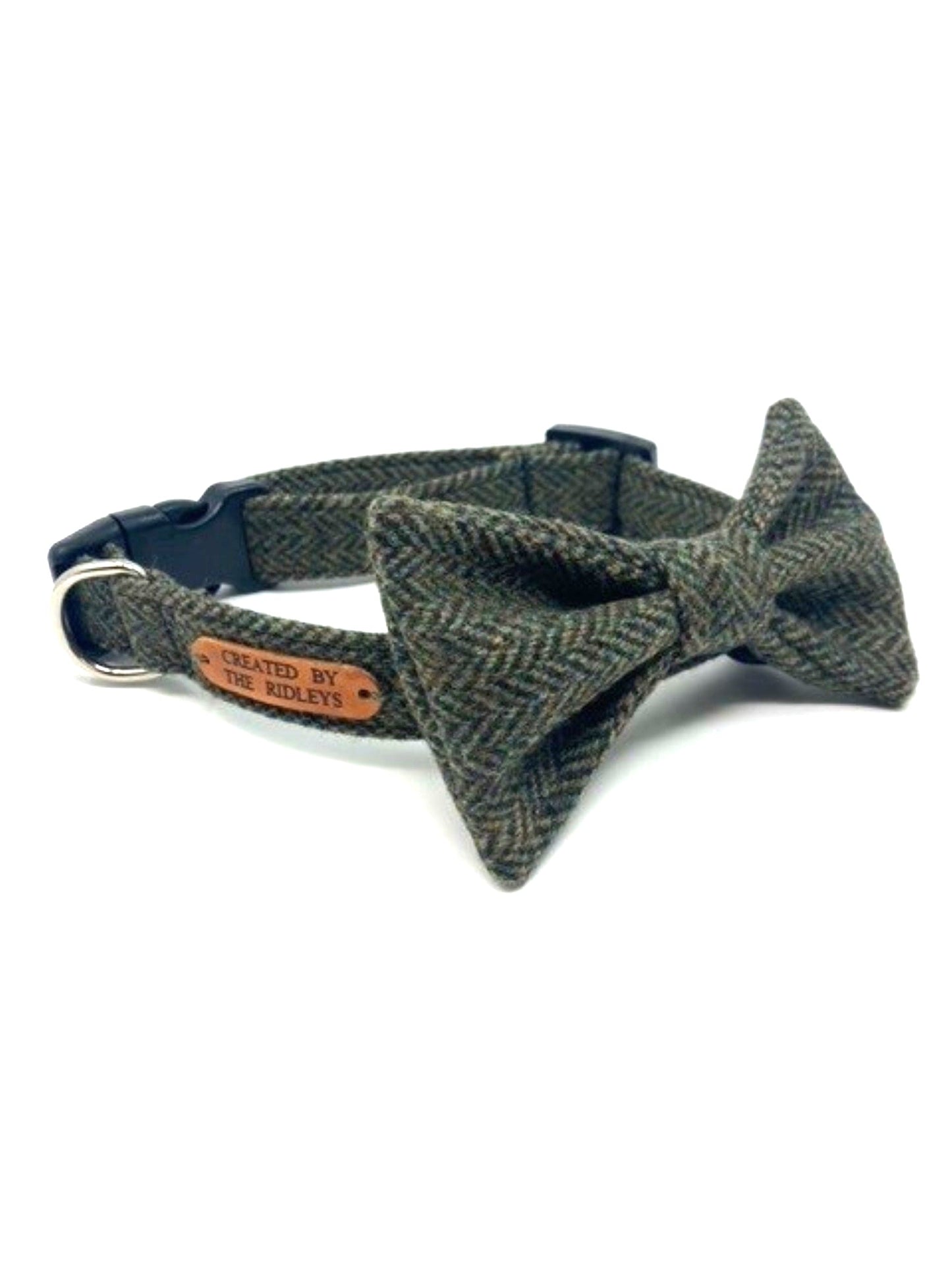 A Handmade Moss Herringbone Tweed Dog Collar by Created By The Ridleys presented with a stylish matching bow tie, illustrating the perfect combination of elegance and functionality.