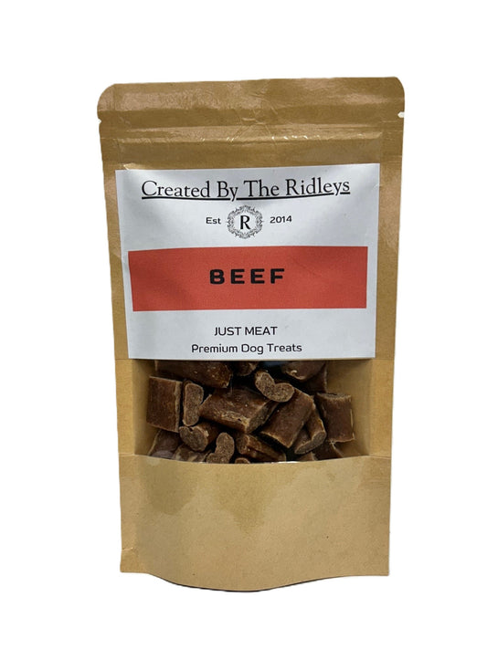 Bag of beef dog treats labeled 'Created By The Ridleys' on a white background