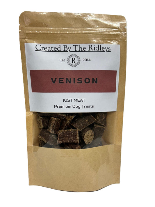 Bag of venison dog treats labeled 'Created By The Ridleys' on a white background