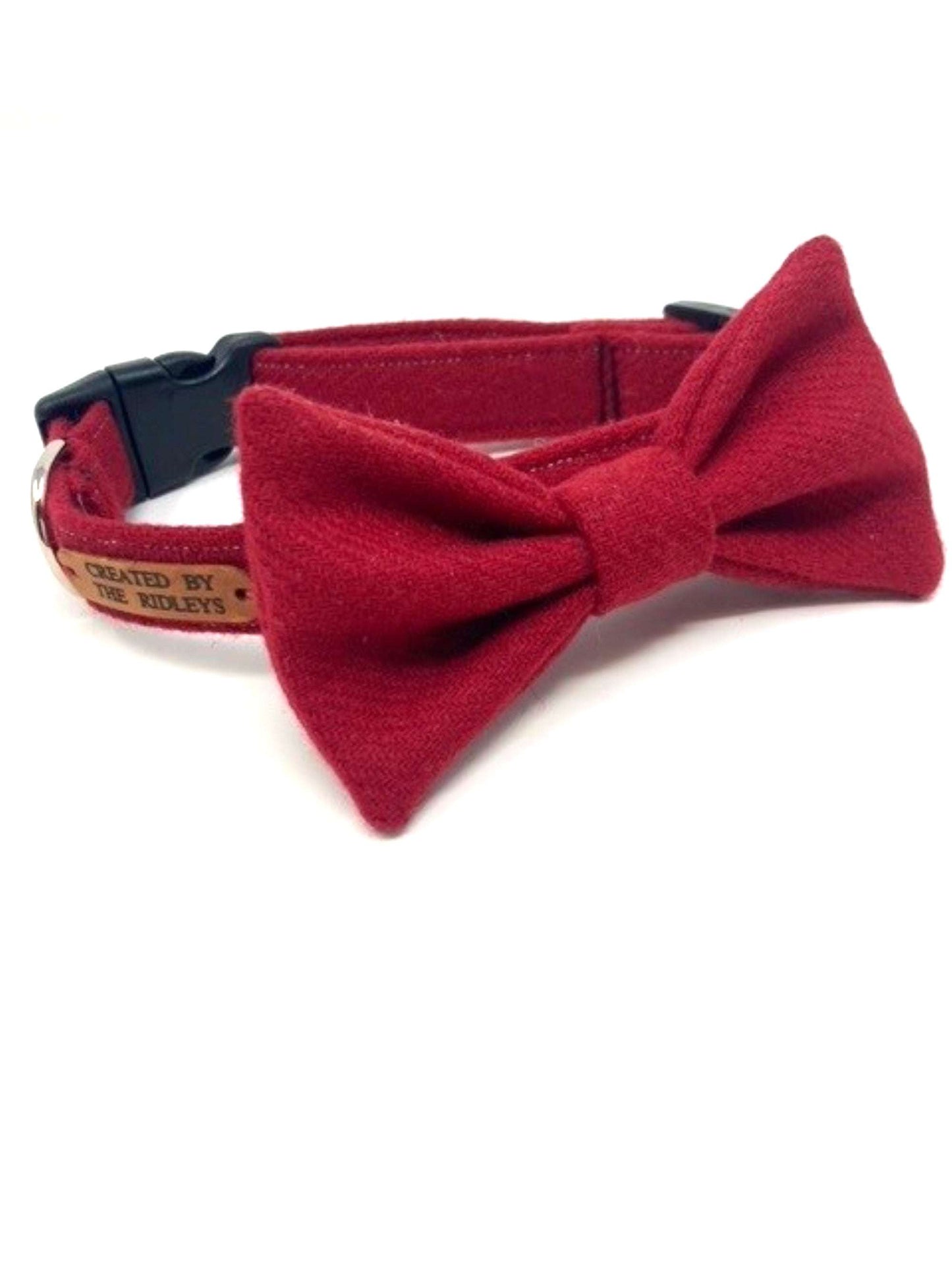 Close-up of a handmade red tweed bow tie designed for dogs by The Ridleys, perfectly matching the collar.